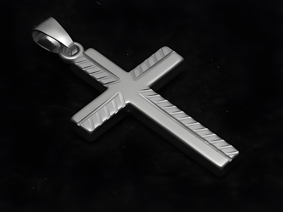 Kreuz Diamantschliff Anhänger aus Sterling Silber, hergestellt von Juwelier Harnisch, mit strukturiertem Muster auf der Oberfläche, elegante und zeitlose Gestaltung.