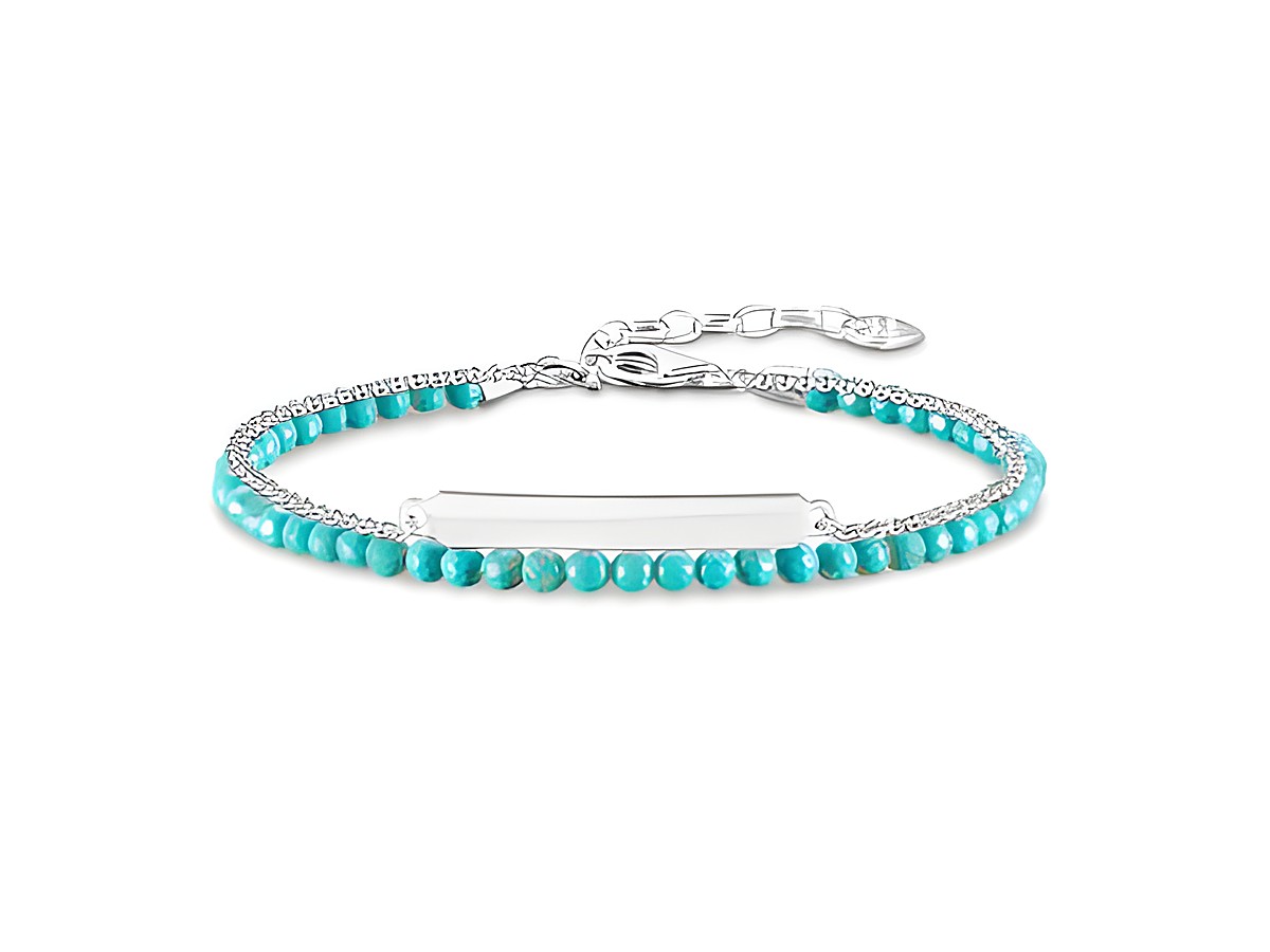 Ein elegantes Thomas Sabo Armband aus Türkis mit einer silbernen Bridge, ideal für einen Handgelenksumfang von 16 bis 19 cm, gefertigt aus hochwertigen Materialien.