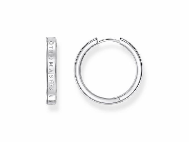 Zwei elegante Creolen aus Silber von Thomas Sabo, Modell CR715-051-14, mit Zirkonia in Weiß, auf dem Bild in verschiedenen Ansichten dargestellt.