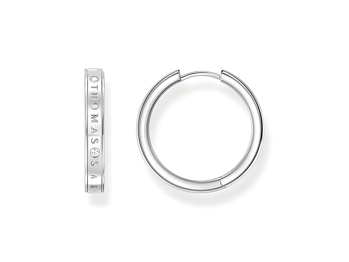 Zwei elegante Creolen aus Silber von Thomas Sabo, Modell CR715-051-14, mit Zirkonia in Weiß, auf dem Bild in verschiedenen Ansichten dargestellt.