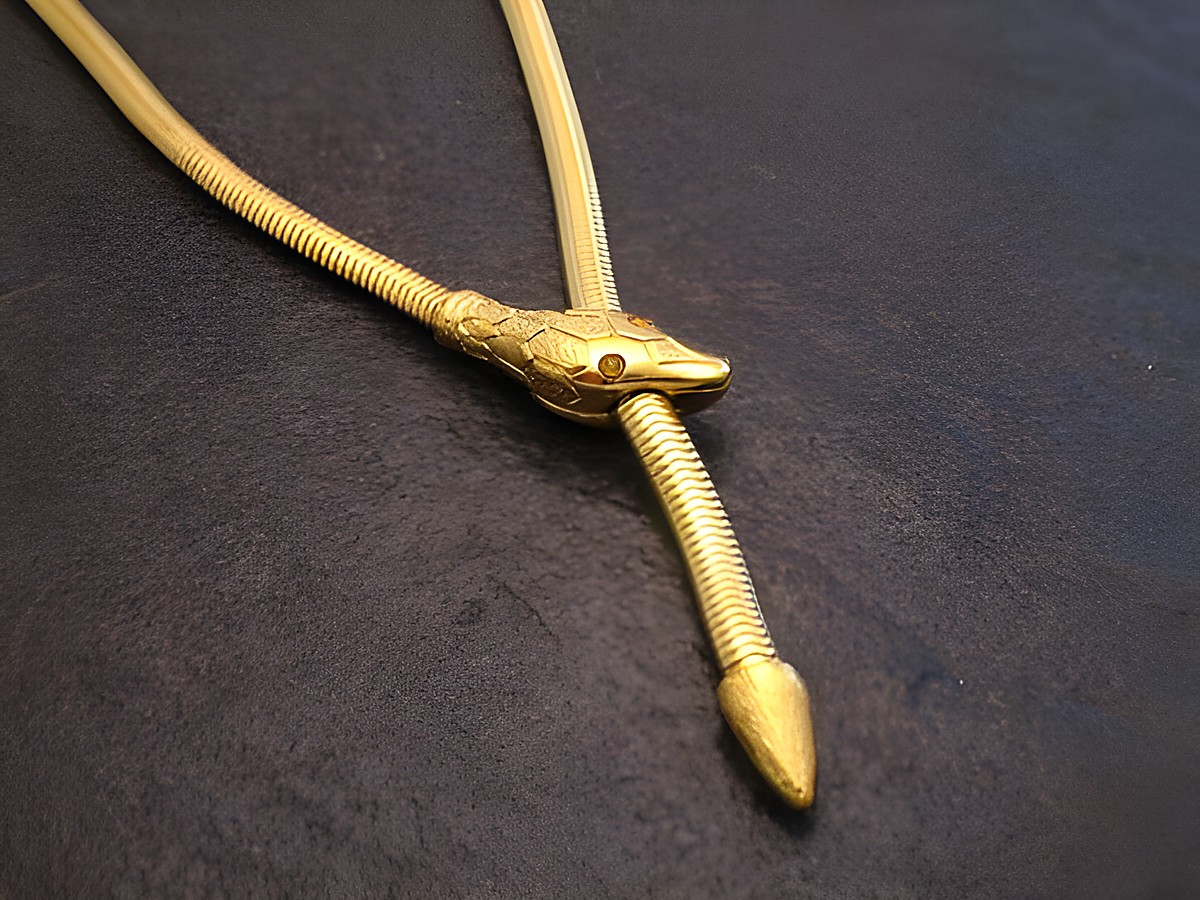 Schlangen Y Kette gut vergoldet 62 cm -City- Gelb von Juwelier Harnisch, mit detailliertem Schlangenkopf und glänzender Oberfläche, elegant und stilvoll, ideal für besondere Anlässe.