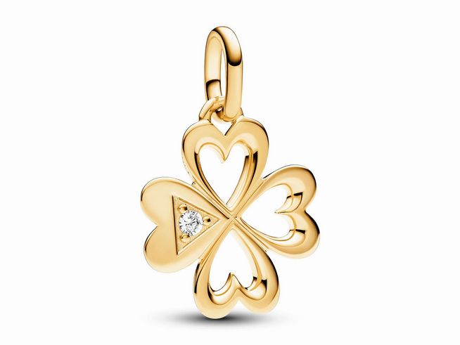Ein Herz-Medaillon-Charm in Form eines vierblättrigen Kleeblatts aus gelbgold vergoldetem Material, verziert mit Zirkonia, hergestellt von Pandora ME für besondere Momente.