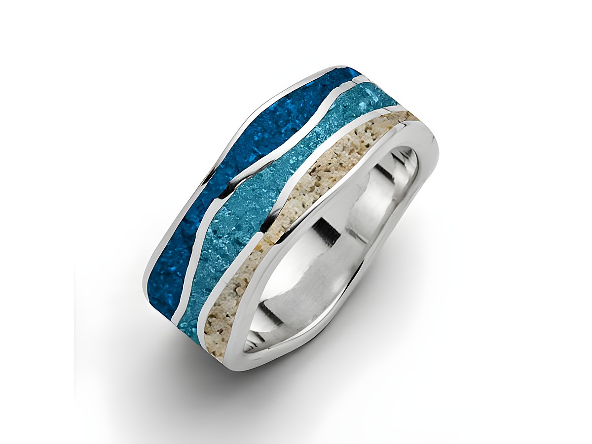 Der DUR Strandring aus Sterling Silber zeigt ein wellenförmiges Design in Blau und Sandtönen, symbolisiert den Strand und das Meer, Größe 58, Modell R5588.58.