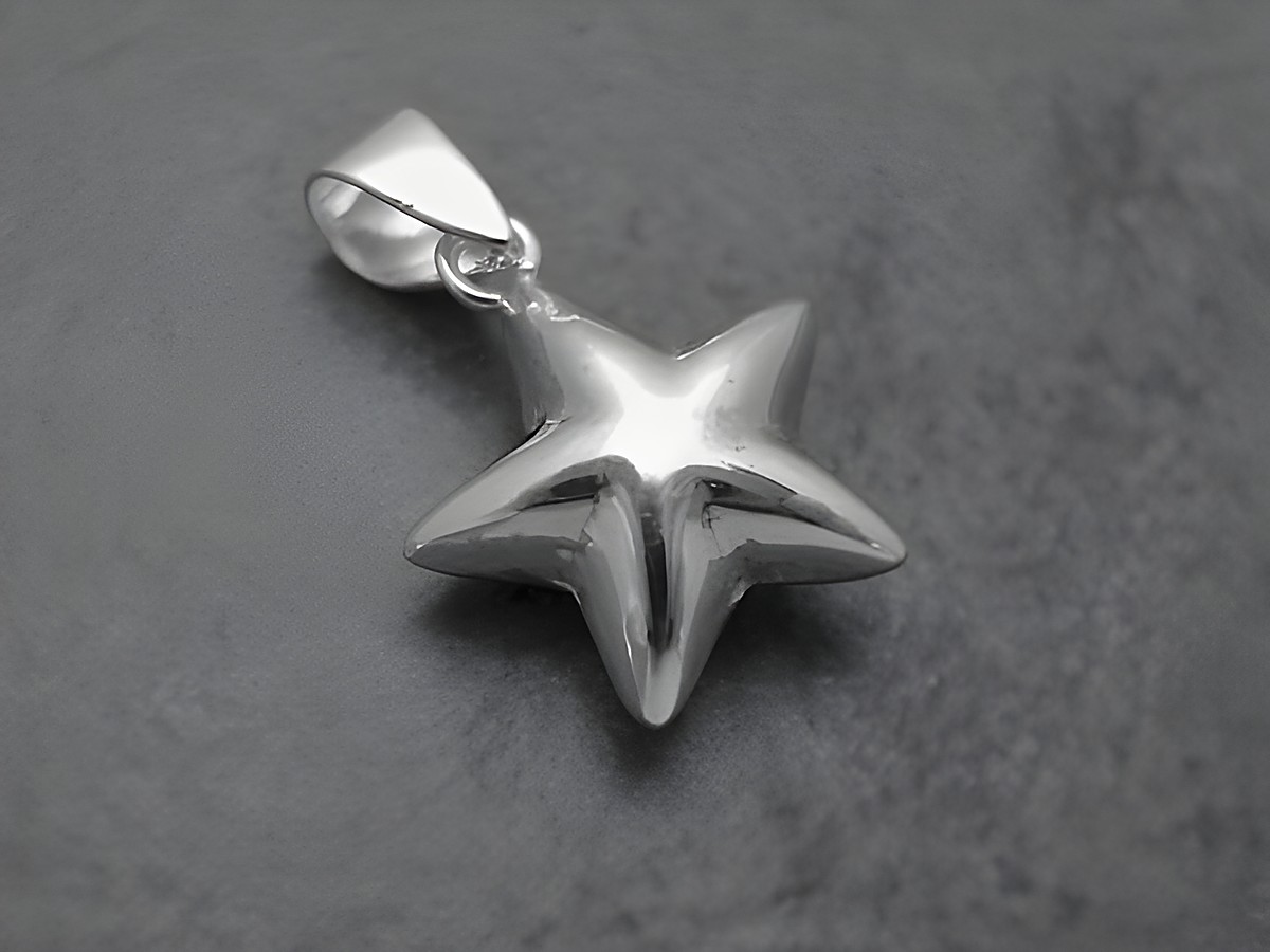 Anhänger Stern aus Silber, plastisch gestaltet, Hersteller Juwelier Harnisch, inspiriert von Sonne, Mond und Sterne. Elegantes Schmuckstück für besondere Anlässe.