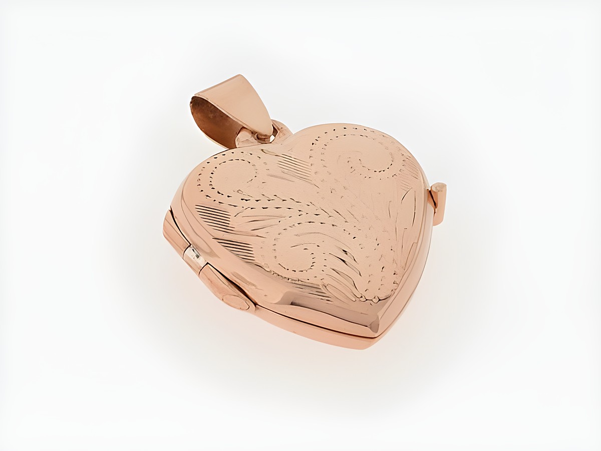 Silber Medaillon in Herzform, rosé vergoldet mit floralem, verschlungenem Design, Hersteller Juwelier Harnisch. Ideal für persönliche Erinnerungen oder als Geschenk.