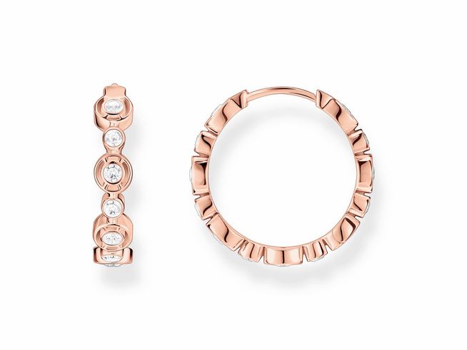 Creolen von Thomas Sabo aus vergoldetem Roségold mit Zirkonia in Weiß, elegant und feminin, in einem modernen Design. Ideal für besondere Anlässe oder den Alltag.