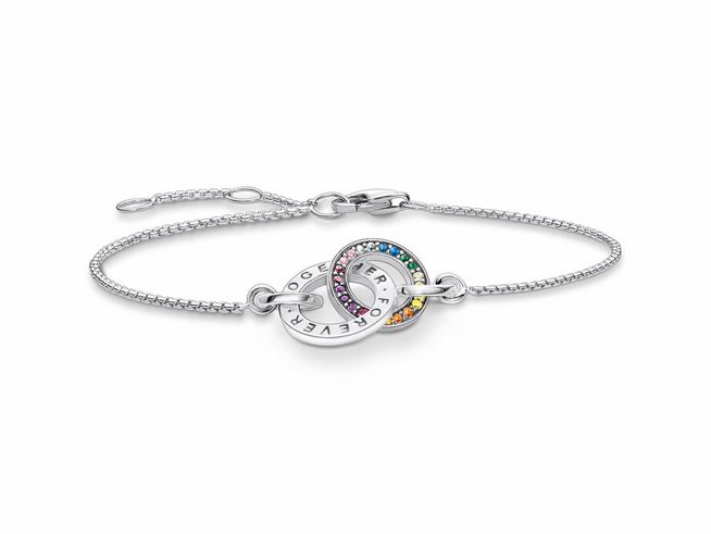 Silbernes Armband von Thomas Sabo mit geschwungenem Design, verziert mit bunten Glas-Keramik Steinen und Zirkonia, im verstellbaren Maß von 16 bis 19 cm.