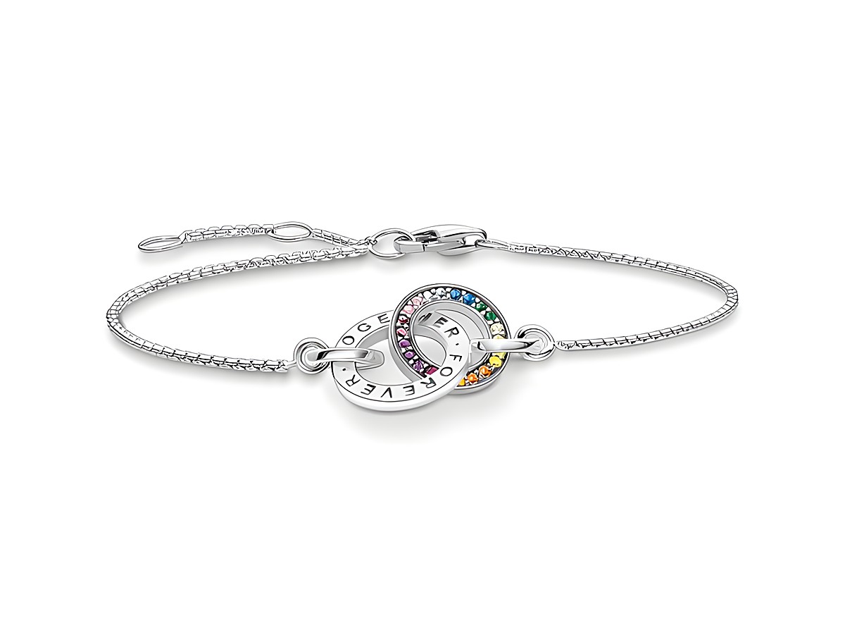 Silbernes Armband von Thomas Sabo mit geschwungenem Design, verziert mit bunten Glas-Keramik Steinen und Zirkonia, im verstellbaren Maß von 16 bis 19 cm.