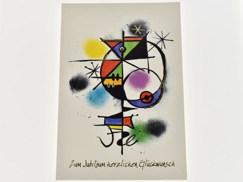 Künstlerisch gestaltete Glückwunschkarte zum Jubiläum mit bunten geometrischen Formen und spritziger Farbgebung, verziert mit dem Schriftzug "Zum Jubiläum herzlichen Glückwunsch".