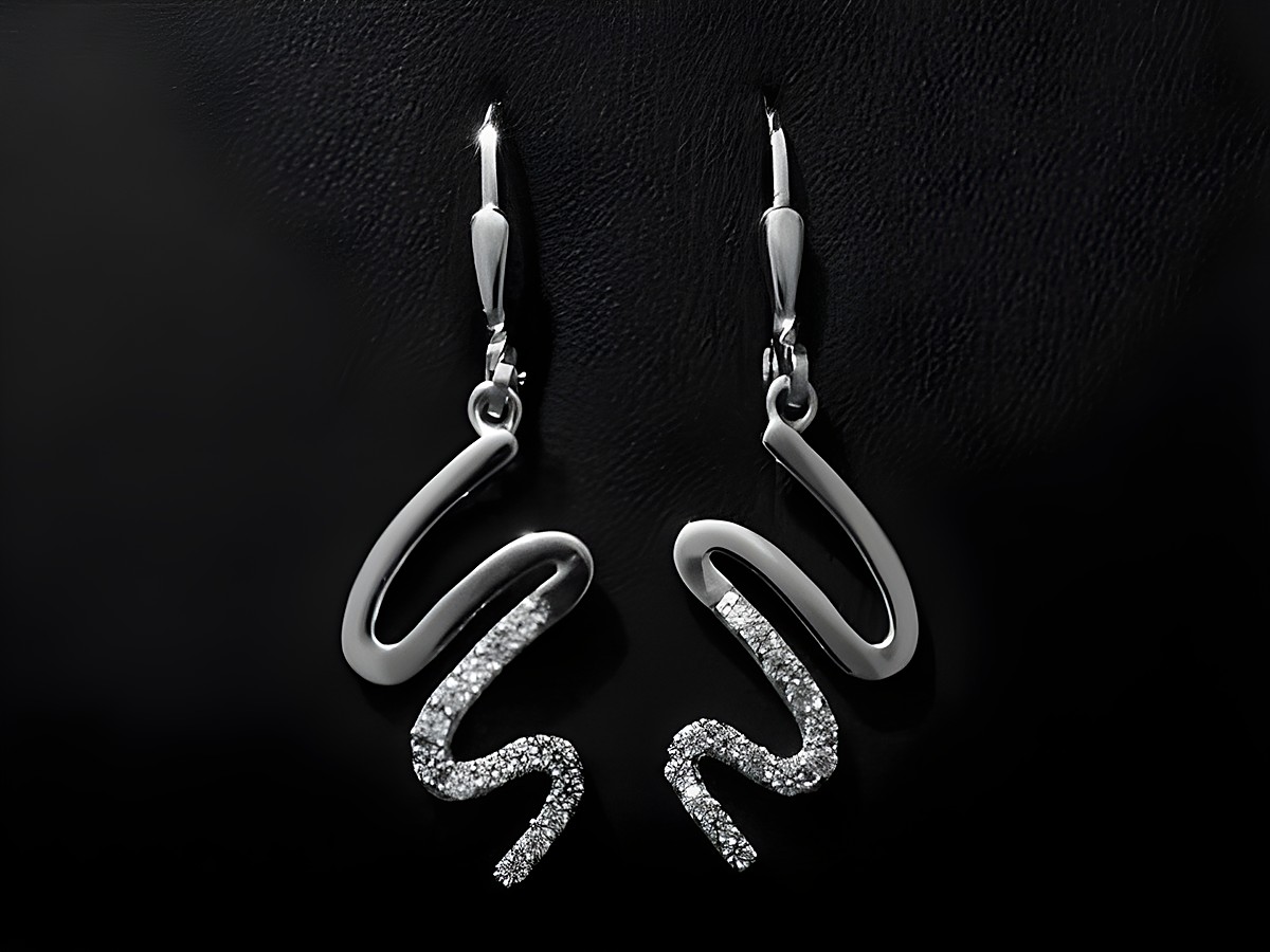 Silber Ohrringe in Schlangenform, Ohrhänger rhodiniert mit Zirkonia, Hersteller Juwelier Harnisch, elegant und stilvoll mit funkelnden Steinen.