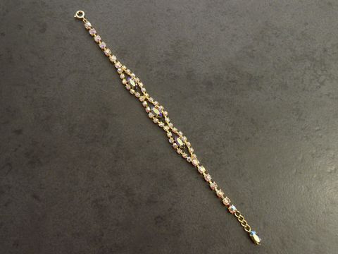 Strass Armband weiblich bunt 19-20 cm goldfarben vom Hersteller Juwelier Harnisch mit glitzernden Strasssteinen für einen eleganten Look. Ideal für besondere Anlässe.