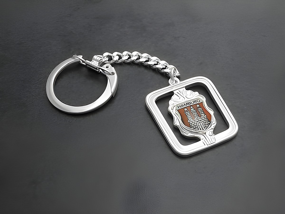 Schlüsselanhänger mit versilbertem Hamburg Wappen, gefertigt von Juwelier Harnisch, in silberfarbenem Design, ideal als persönliches Accessoire oder Geschenk.