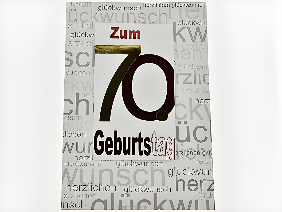 Geburtstagskarte zum 70. Geburtstag in rot und gold auf bedruckter Karte, Hersteller: Juwelier Harnisch, mit dem Aufdruck "Zum 70. Geburtstag" und verschiedenen Glückwunsch-Texten im Hintergrund.