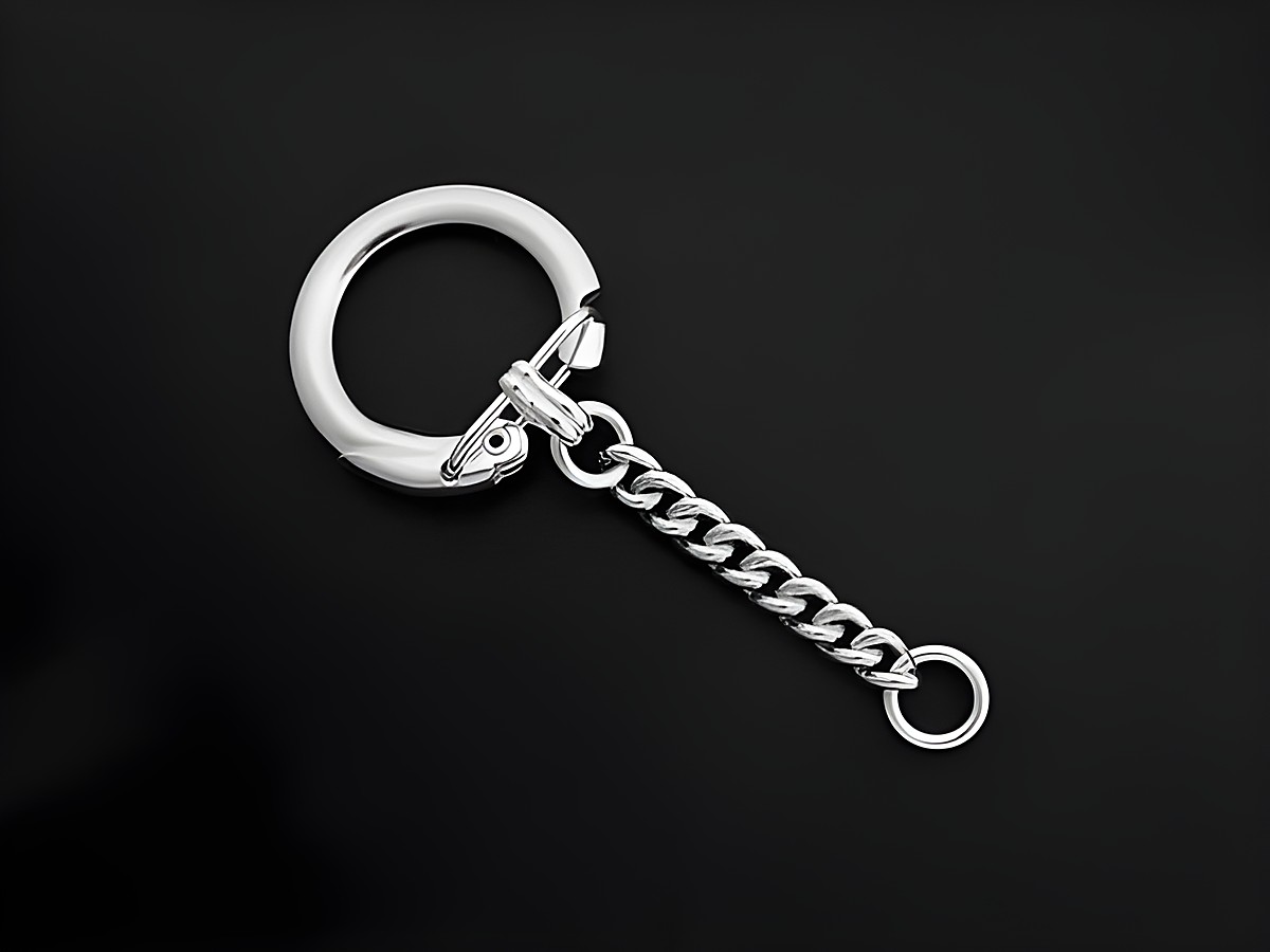 Schlüsselanhänger aus 925 Sterling Silber mit panzerkettenartigem Design, blanko und mit Mechanik, hergestellt von Juwelier Harnisch, ideal für individuelle Gestaltung.