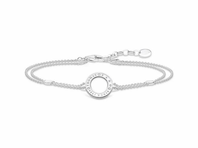 Silbernes Armband von Thomas Sabo mit Zirkonia in weiß, verziert mit einem runden Anhänger und feiner Kettenstruktur, verstellbar von 16 bis 19 cm.