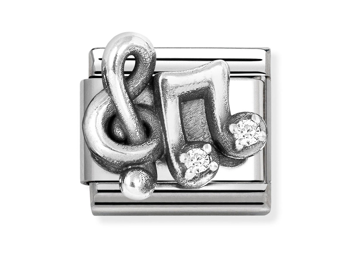 Ein charm aus oxidiertem Sterling Silber in Form eines Violinschlüssels mit zwei Noten. Die Noten sind mit Zirkonia besetzt und strahlen Eleganz und Musikalität aus.