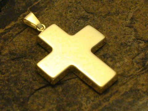 Kreuz mittel glänzend Anhänger Gold 333, Hersteller Juwelier Harnisch, klassisch, auf steinfarbenem Untergrund, zeichnet sich durch schlichtes und elegantes Design aus.