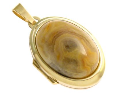 Mexikanischer Achat in ovaler Form, umrahmt von edlem Gold 333, sorgt für einen eleganten Look. Hersteller: Juwelier Harnisch, perfektes Schmuckstück für besondere Anlässe.