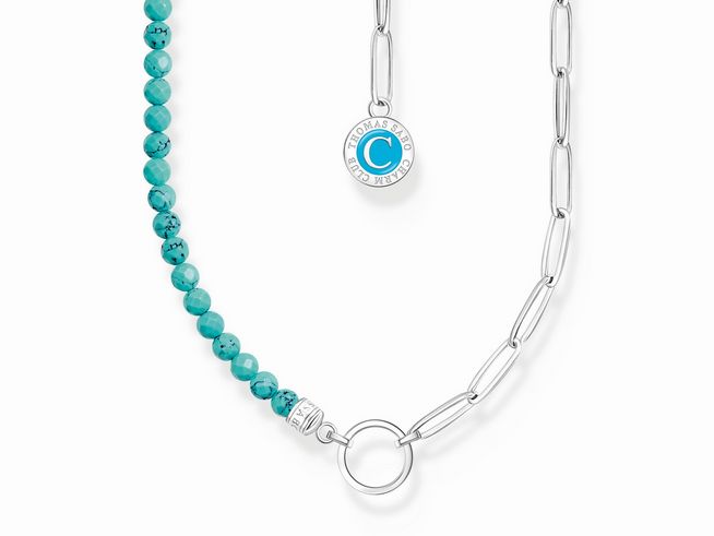 Kette von Thomas Sabo mit imitiertem Türkis in Gliederform, kombiniert mit silbernen und emaillierten Elementen, verstellbare Länge von 32 bis 37 cm.
