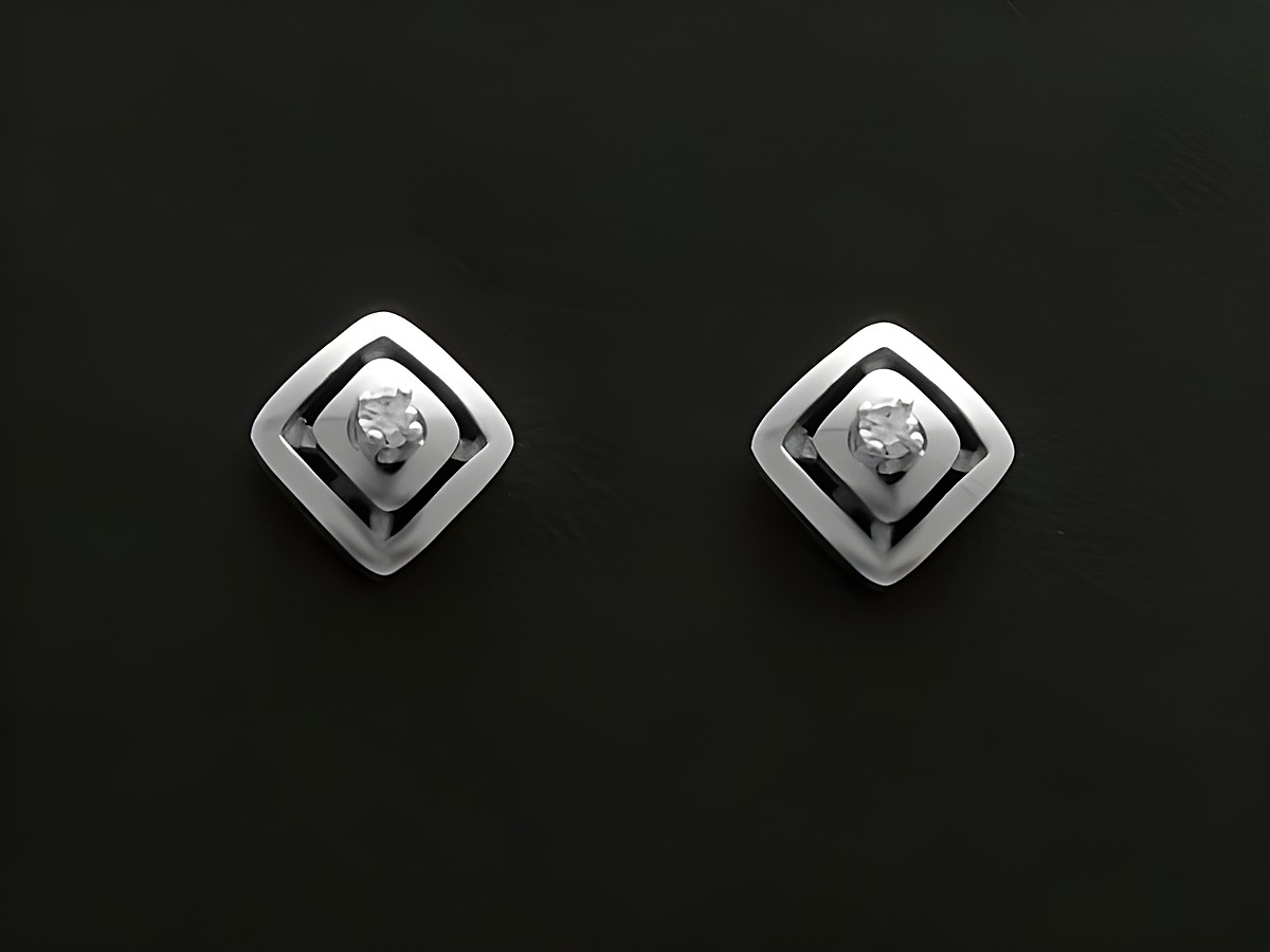 Weißgold Ohrstecker dreams mit Diamant Ohrringen, Hersteller Juwelier Harnisch, elegantes Design mit stilvollen Details und funkelndem Diamanten im Mittelpunkt.
