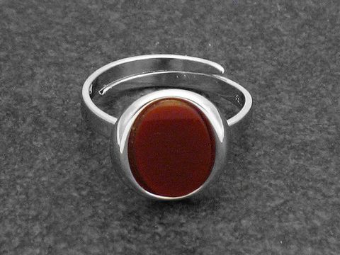Silberring rho OVAL verstellbar mit rotem Karneol, rhodiniert, hergestellt von Juwelier Harnisch, modern und stilvoll, ideal für jeden Anlass.