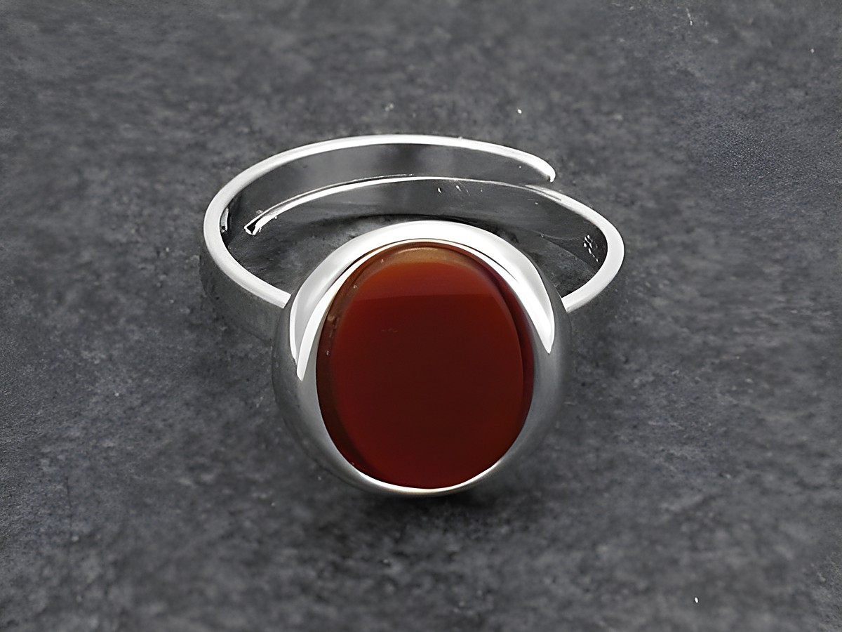 Silberring rho OVAL verstellbar mit rotem Karneol, rhodiniert, hergestellt von Juwelier Harnisch, modern und stilvoll, ideal für jeden Anlass.