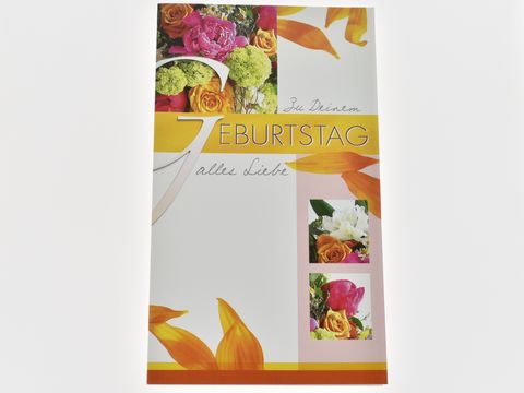 Geburtstagskarte mit bunten Blumen und der Aufschrift Zum deinen Geburtstag alles Liebe. Hersteller: Juwelier Harnisch. Die Karte zeigt florale Motive in lebendigen Farben.
