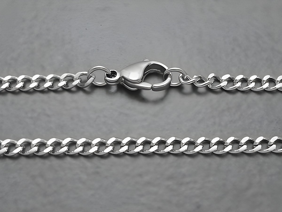 Edelstahlkette Panzerkette 3 mm 19 cm Armband vom Hersteller Juwelier Harnisch, detailreiche Darstellung der Kette mit sicherem Verschluss und glänzender Oberfläche.