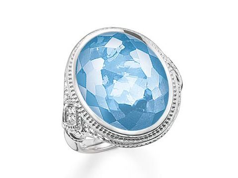 Silberner Ring von Thomas Sabo mit sinthetischem Spinell in hellblauem Facettenschliff und Zirkonia, Größe 52. Elegantes Design für stilvolle Akzente.