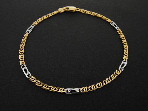 Armband Stäbchenpanzer in Gold 750 bicolor, 20,5 cm lang, von Juwelier Harnisch, mit Gold 333, elegantes Design mit Gold- und Weißgold-Elementen.