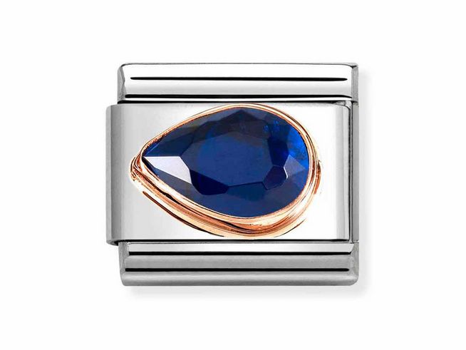 Dunkelblaue Zirkonia im Tropfenformat, eingehüllt in eine roségoldene Fassung, auf silbernem Edelstahl, elegant und modern, ideal für individuelles Schmuckdesign von Nomination.