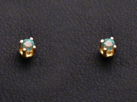 Gold Ohrringe weiblich mit Smaragd, Hersteller Juwelier Harnisch, elegantes Design in goldener Fassung, funkelnde Steine, ideal für besondere Anlässe oder den Alltag.