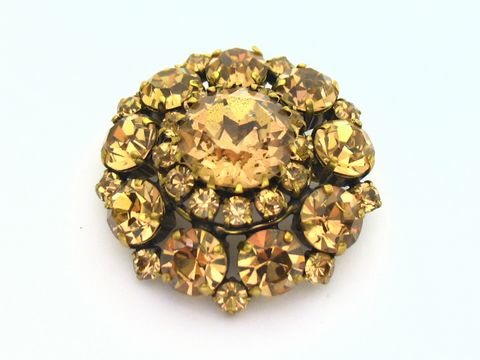 Runde Strass Brosche in Gelb und Braun, neu vom Hersteller Juwelier Harnisch, mit zahlreichen funkelnden Steinen, ideal für jeden schicken Look.
