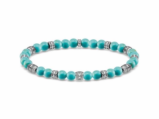 Sterling Silber Armband von Thomas Sabo mit geschliffenen Perlen in imitiertem Türkis und filigranen silbernen Zwischenelementen, Länge 19 cm, bis 20 cm einstellbar.
