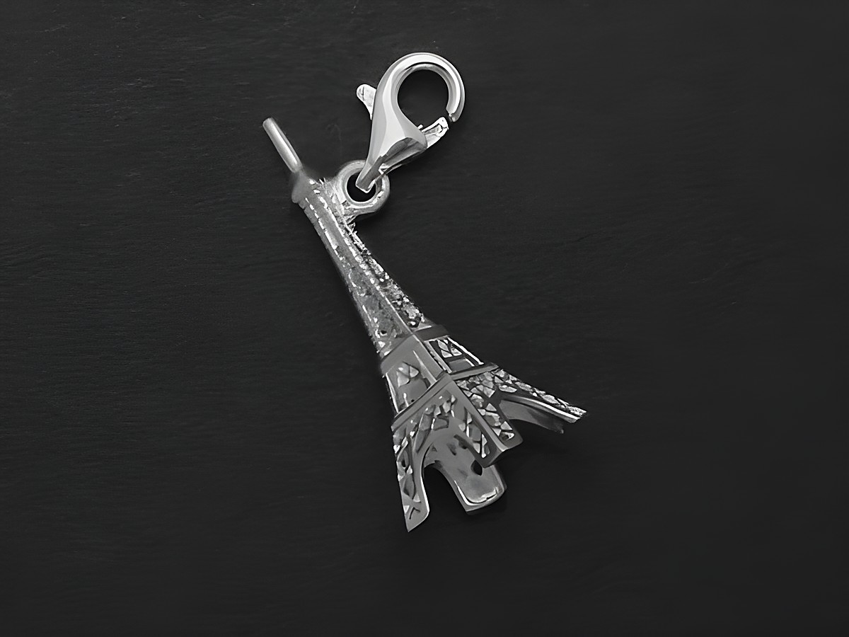 Silber Anhänger in Form eines niedlichen Eiffelturms, Hersteller Juwelier Harnisch, ideal für diverse Motive.