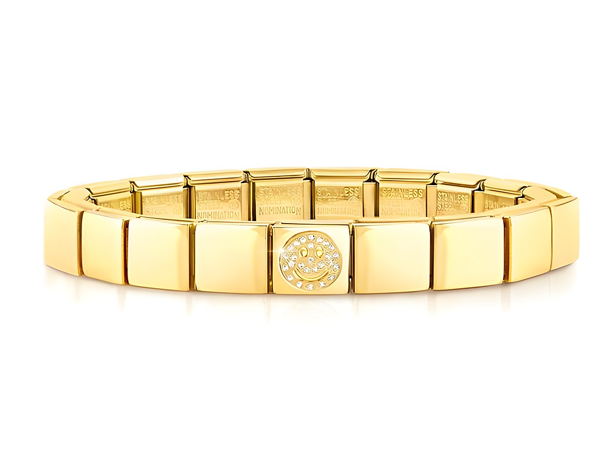 Armband von Nomination aus Edelstahl mit PVD-Beschichtung in Gelbgold, verziert mit einem lächelnden Smiley und funkelnden Steinen. Ideal für einen eleganten Look.