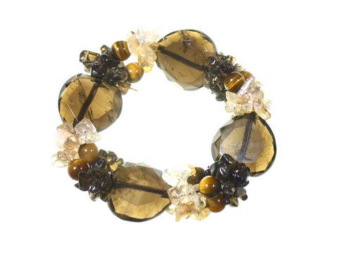 Armband mit echten Steinen aus Rauchquarz und Tigerauge, gefertigt vom Juwelier Harnisch, elegante Kombination aus verschiedenen Edelsteinen.