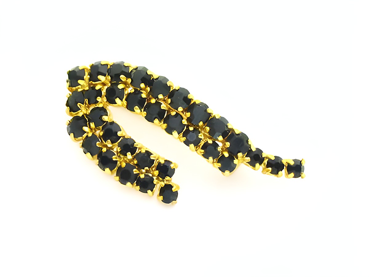 Strass Brosche in Schwarz - Länglich - Gefasst, Hersteller: Juwelier Harnisch, elegante Brosche mit funkelnden schwarzen Strasssteinen in goldener Fassung. Ideal für besondere Anlässe.