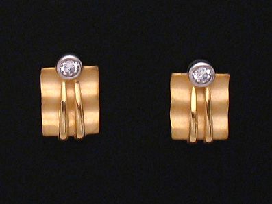 Gold Ohrringe verführerisch im bicolor DESIGN mit Zirkonia, Hersteller Juwelier Harnisch, elegant und modern, perfekt für besondere Anlässe oder den Alltag.