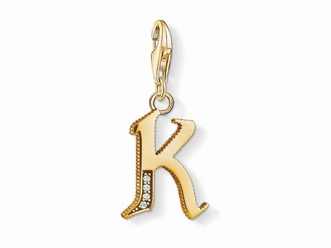 Charms-Anhänger Buchstabe K von Thomas Sabo, vergoldet, mit funkelnden Verzierungen, ideal für individuelle Schmuckstücke und als personalisierte Geschenkidee.