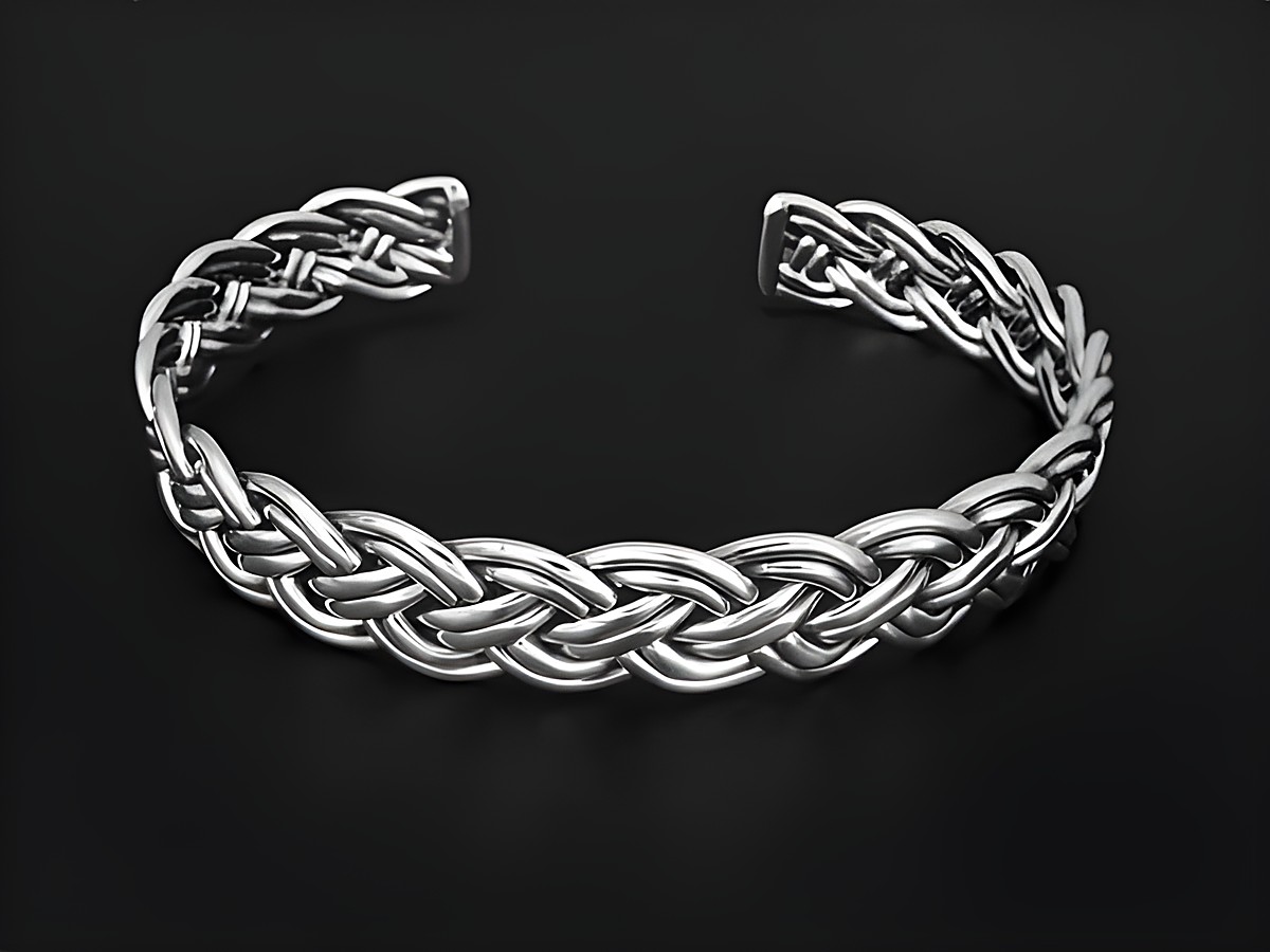 Silber Armreifen 18 cm geflochten von Juwelier Harnisch, elegantes Design mit detailreicher Flechtung, ideal für jeden Anlass und hochwertig verarbeitet.