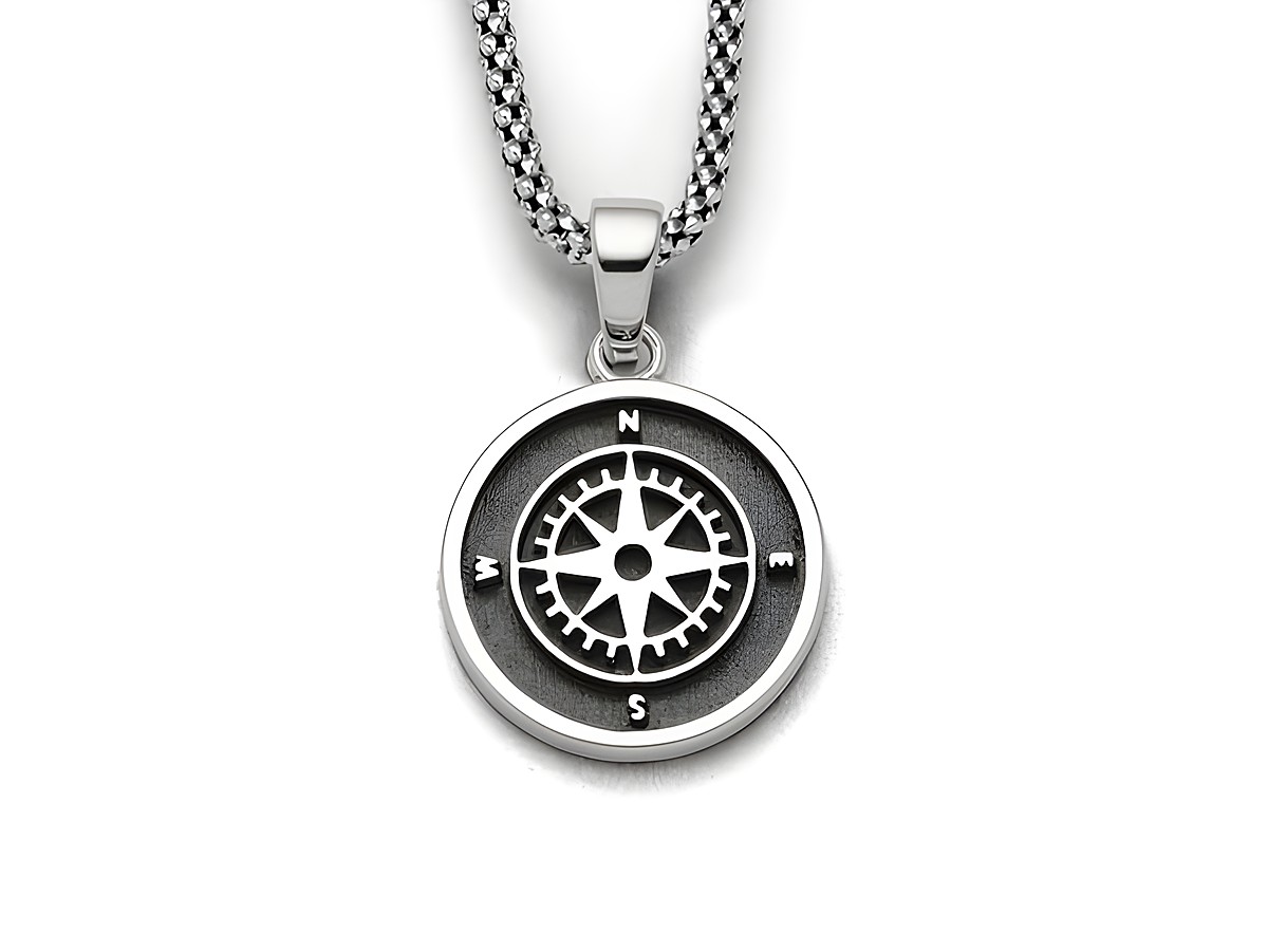 DUR Anhänger Kompassrose 2.0 aus Sterling Silber, rundes Design mit Kompasssymbol und Himmelsrichtungen, an einer feinen Kette befestigt. Ideal als modisches Accessoire.