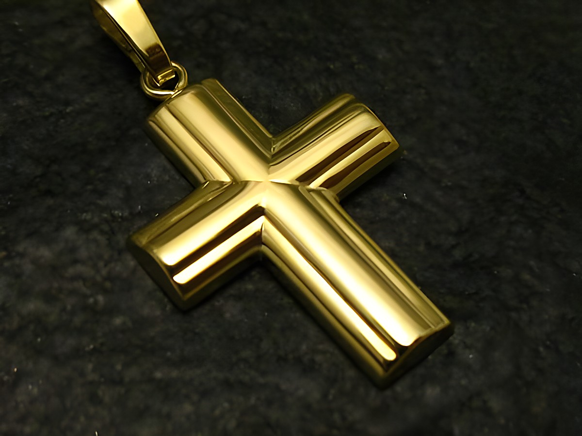Gold Anhänger Kreuz aus Gold 333, hergestellt von Juwelier Harnisch, klassisches Design, glänzende Oberfläche und zeitlose Form, ideal für besondere Anlässe oder als Schmuckstück im Alltag.