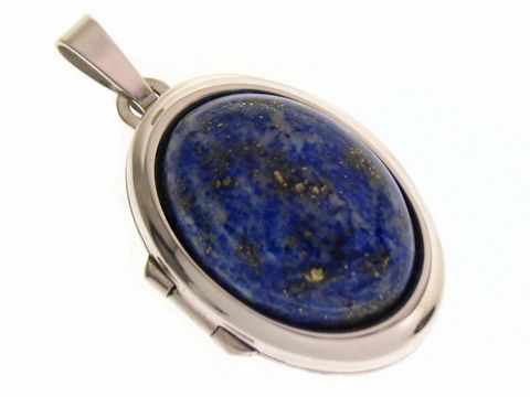 Lapislazuli Medaillon in Cabochonform aus Weißgold 585, hergestellt von Juwelier Harnisch, zeigt einen ovalen, tief blauen Edelstein mit goldenen Einschlüssen, elegant gefasst in hochwertigem Weißgold.