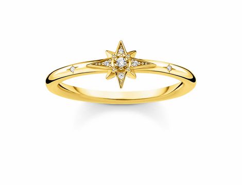 Silberner Ring von Thomas Sabo mit Gelbgoldakzenten, Größe 50, verziert mit klaren Zirkonia und einem sternförmigen Design in der Mitte. Elegantes Schmuckstück für besondere Anlässe.