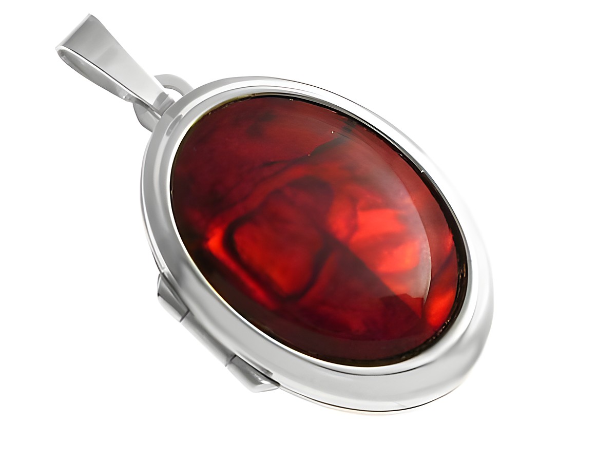 Perlmutt Cabochon in Rot, eingefasst in einem eleganten Sterling Silber Medaillon, hergestellt von Juwelier Harnisch, ideal für einen stilvollen Akzent.