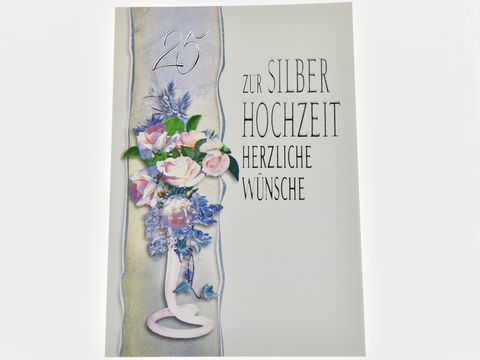 Hochzeitskarte zur Silberhochzeit mit einer stilvollen Abbildung eines bunten Blumenstraußes und dem Text Herzliche Wünsche in eleganter Schrift. Hersteller Juwelier Harnisch.