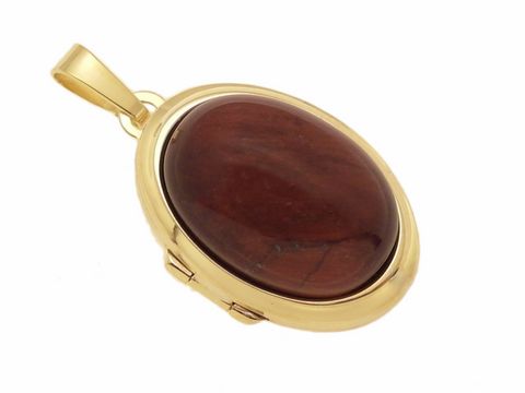Ein elegantes Medaillon aus Gold 585 mit einem rotbraunen Tigerauge Cabochon, hergestellt von Juwelier Harnisch. Das Schmuckstück besticht durch seine edle Ausstrahlung.
