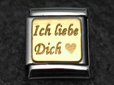 Bicolor Element mit Gravur "Ich liebe Dich" und Herzmotiv, Hersteller Nomination, geeignet zur Verwendung in Armbändern, Ausdruck von Zuneigung und Liebe.