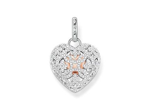 Medaillon von Thomas Sabo in Herzform aus Silber mit vergoldetem Roségold-Innenleben und Zirkonia-Verzierungen, zeitloses Design und elegantes Schmuckstück.
